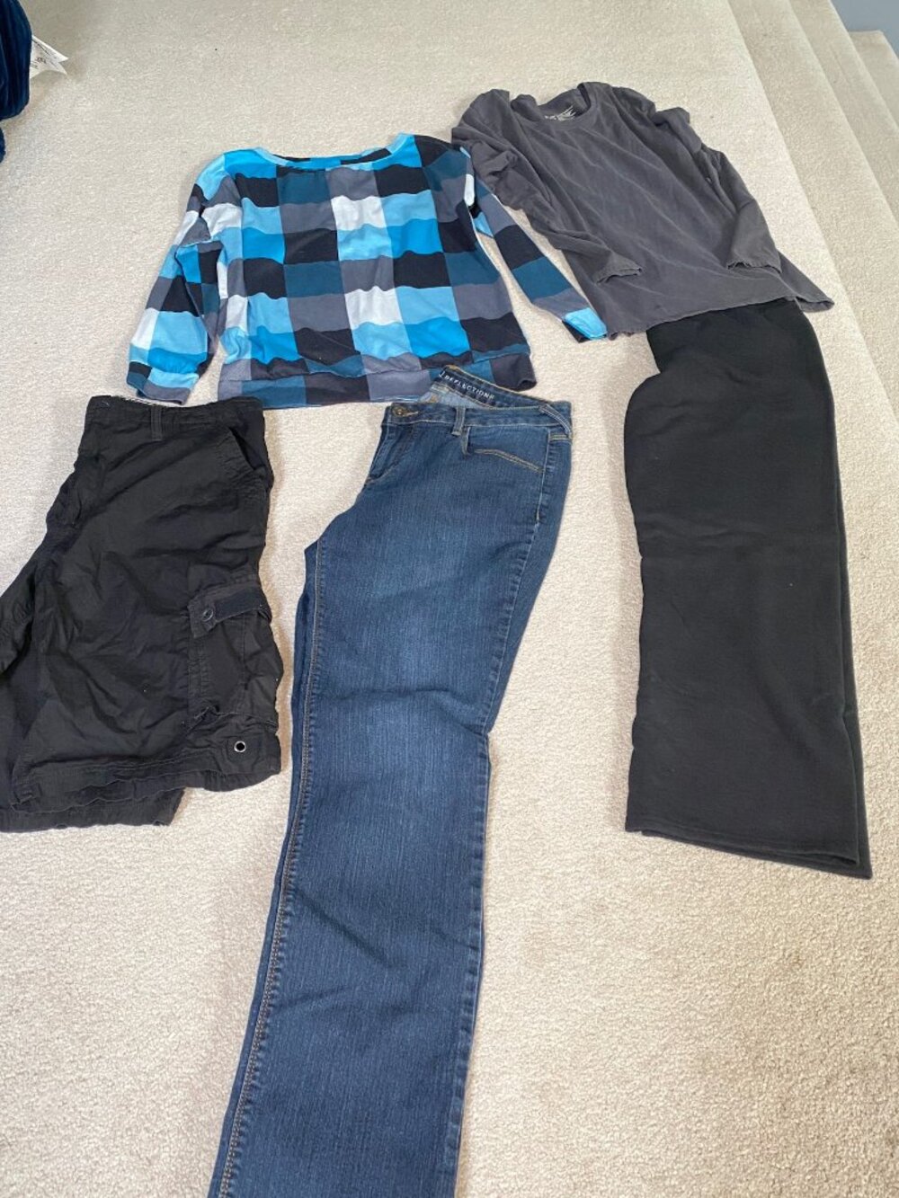 Size 12 Women's clothing  3 total Shirts 2 pair pants and one pair of shorts.